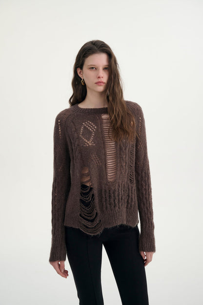 Distressed relaxed sweater